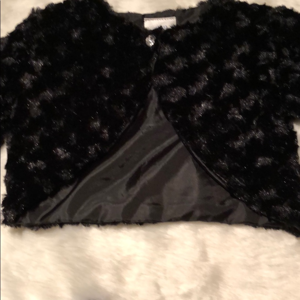 A black dressy shaw for a young lady.